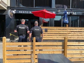 Ottawa Police at the scene of an overnight shooting at J'TM Resto Bar