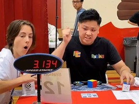 Max Park setting Guinness World Record for solving Rubiks Cube.