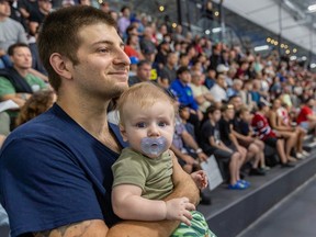 Antoine Auclair and his 5-month-lld son, Louis-Philippe, were among the Canadiens fans who packed the Bell Sports Complex in Brossard on Tuesday to watch a four-on-four scrimmage on the final day of the team’s development camp.