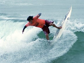 Mikala Jones competes in a surfing competition in Huntington Beach, California.