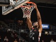 A member of the Ottawa BlackJacks dunk the ball.