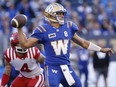 Winnipeg Blue Bombers quarterback Zach Collaros throws against the Calgary Stampeders.