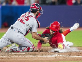 Bo Bichette of the Toronto Blue Jays is tagged out at home plate by Connor Wong of the Boston Red Sox to end the game in the ninth inning in their MLB game at the Rogers Centre on July 1, 2023 in Toronto.