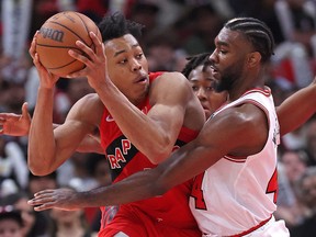 Patrick Williams, right, of the Chicago Bulls defends against Scottie Barnes of the Toronto Raptors at the United Center on March 21, 2022, in Chicago. The Raptors and Bulls will be in a group with three other Eastern Conference teams during a new tournament next season.