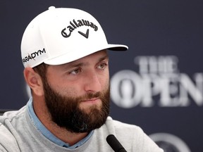 Jon Rahm of Spain speaks to the media during a press conference prior to The 151st Open at Royal Liverpool Golf Club on July 18, 2023 in Hoylake, England.