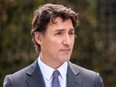 Prime Minister Justin Trudeau addresses a joint press conference with the Latvian Prime Minister (not pictured) at the Adazi military base in Riga, Latvia, where they visited the Canada-led multinational NATO enhanced Forward Presence Battle Group, on July 10, 2023.