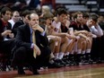 Carleton University Ravens mens basketball team head coach Dave Smart against the University of Saskatchewan watches attentively during the first half of the semi final game against the University of Saskatchewan in the CIS Men's Basketball Tournament in Ottawa on Saturday, March 20, 2010. The Ravens lost to the Saskatchewan Huskies 86-82 and advanced to the final.