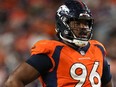 Denver Broncos defensive end Eyioma Uwazurike looks on during an NFL preseason football game against the Minnesota Vikings, Aug. 27, 2022, in Denver.