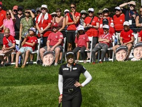 Fans of Brooke Henderson of Canada watch as she stands on the green of the 14th hole during the final round of the CP Women's Open in Ottawa, on Sunday, Aug. 28, 2022. Canadian Pacific Kansas City has extended its sponsorship of the LPGA Tour's Canadian Women's Open.