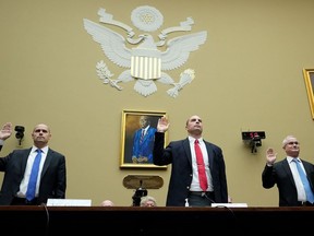 Ryan Graves, executive director of Americans for Safe Aerospace, David Grusch, former National Reconnaissance Officer Representative of Unidentified Anomalous Phenomena Task Force at the U.S. Department of Defense, and Retired Navy Commander David Fravor are sworn-in during a House Oversight Committee hearing titled "Unidentified Anomalous Phenomena: Implications on National Security, Public Safety, and Government Transparency" on Capitol Hill in Washington, D.C., Wednesday, July 26, 2023.