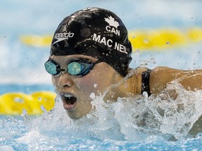 Maggie Mac Neil swims her way to winning the women's 100-metre butterfly at the Canadian swimming trials