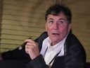Liberal cabinet minister Dominic LeBlanc enjoys a cigar at a retreat in P.E.I.
