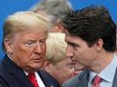 Then-U.S. president Donald Trump talks with Prime Minister Justin Trudeau during a North Atlantic Treaty Organization Plenary Session at the NATO summit in Watford, Britain, in December 2019.