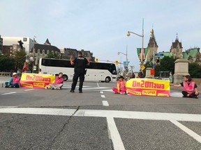 On2Ottawa protesters blocked traffic near the Fairmont Château Laurier hotel on Monday, August 21 2023.