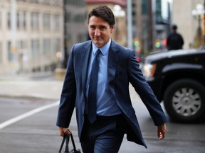 Prime Minister Justin Trudeau arrives for a cabinet meeting