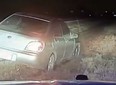 Car on shoulder of highway after getting pulled over.