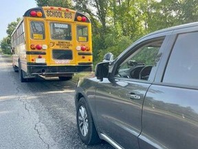 OPP said there were no children aboard this school bus stopped for speeding on Rideau River Road Friday.