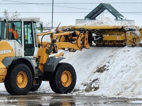 front-end-loaders clearing snow