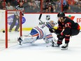 Edmonton Oilers goaltender Jack Campbell (36) stops Ottawa Senators centre Shane Pinto during a game last season.