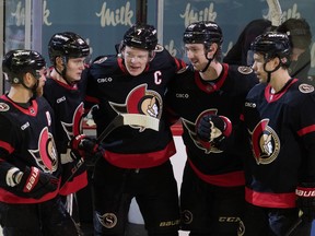 Ottawa Senators winger Brady Tkachuk (7) celebrates his goal with teammates against the Tampa Bay Lightning.
