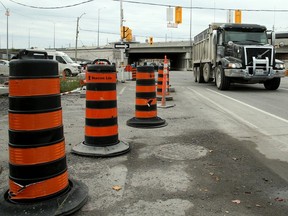 OTTAWA. OCTOBER 24, 2023 #139599. Montreal Road, around the highway 174 overpass, where a new LRT station is still being built, is under construction in many parts.