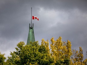 The Canadian flag flies at half mast above the Peace Tower on Parliament Hill on Sept. 13, 2021, during the period when residential school victims were being commemorated.