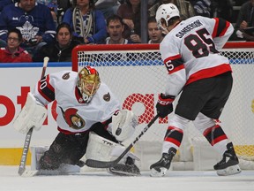 Joonas Korpisalo of the Ottawa Senators makes a stop against the Toronto Maple Leafs.