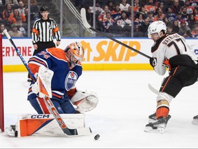 Anaheim Ducks' Frank Vatrano (77) is stopped by Edmonton Oilers goalie Stuart Skinner.