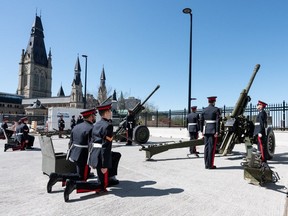 Army reservists from Ottawa-based 30th Field Artillery Regiment, RCA fire 105-mm blank ammunition from their C3 howitzers as gun salutes in honour of Remembrance Day.