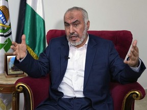 Ghazi Hamad, a member of Hamas' decision-making political bureau, speaks during an interview with The Associated Press in Beirut, Lebanon, Oct. 26, 2023.