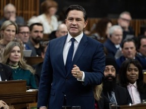 Conservative Leader Pierre Poilievre rises during Question Period, in Ottawa, Wednesday, Nov. 22, 2023.