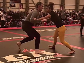 Taelor Moore, right, fought Alice McPike, left, during a Brazilian Jiu-Jitsu tournament in September