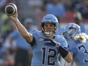 Toronto Argonauts quarterback Chad Kelly (12) throws against the BC Lions during first half CFL action in Toronto on Monday, July 3, 2023. Quarterback Chad Kelly, the CFL's outstanding player, was among seven Toronto Argonauts named to the CFL Players' Association's all-star squad.