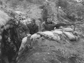 An archive photo shows Canadian troops in October 1951 after the battle at Hill 187 during the Korean War.