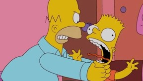 Homer Simpson strangles son Bart on The Simpsons.