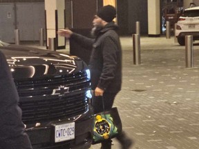 Jagmeet Singh spotted in Toronto on Nov. 23, 2023, carrying a Versace bag.