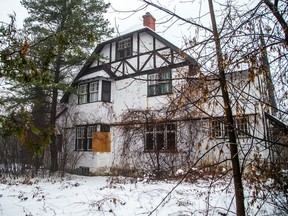 A heritage home on the corner of Lisgar Road and Maple Lane in Rockcliffe Park that shows signs of an overgrown lot and a derelict residence, Sunday, Dec. 10 2023. Ashley Fraser/Postmedia