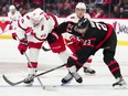 Carolina Hurricanes winger Stefan Noesen (23) keeps the puck from Ottawa Senators defenceman Travis Hamonic.