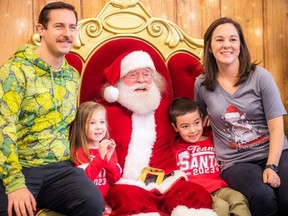 The OSEG Foundation Breakfast with Santa provided the perfect opportunity for a family photograph with Santa. The Whalen family, from left, are Jeremy, three-year-old Hailey, six-year-old Thomas and Sarah.