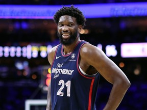 Joel Embiid of the Philadelphia 76ers reacts during the first quarter against the Minnesota Timberwolves.