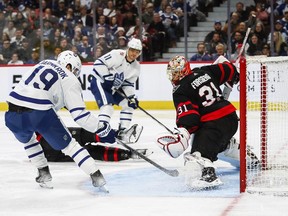 Calle Jarnkrok of the Toronto Maple Leafs scores against Anton Forsberg of the Ottawa Senators
