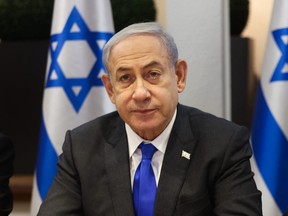 Israeli Prime Minister Benjamin Netanyahu chairs a Cabinet meeting at the Kirya, which houses the Israeli Ministry of Defence, in Tel Aviv on Sunday, Dec. 17, 2023.