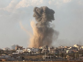 A picture taken from southern Israel near the border with the Gaza Strip on December 9, 2023, shows smoke rising during an Israeli strike in Gaza.