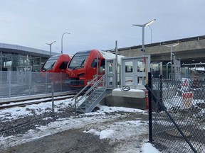 Two Alstom diesel trains sit idle during a test of Bayview Station on the Trillium Line LRT on Thursday, Dec. 14. The Trillium Line is expected to open in late spring 2024.