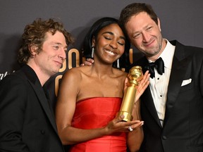 Actor Jeremy Allen White, actress Ayo Edebiri and actor Ebon Moss-Bachrach pose in the press room with the award fore Best Television Series - Musical or Comedy "The Bear" during the 81st annual Golden Globe Awards at The Beverly Hilton hotel in Beverly Hills, Calif., on Jan. 7, 2024.