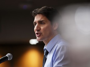 Prime Minister Justin Trudeau address his national caucus during a winter caucus retreat on Parliament Hill in Ottawa on Thursday, Jan. 25, 2024.