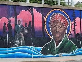 A mural by Madonna Pannell, called Harriet Tubman: A Light Of Hope, adorns a wall near the Niagara Falls Underground Railroad Heritage Center in Niagara Falls, N.Y.