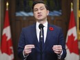 Conservative Leader Pierre Poilievre speaks to reporters in the foyer of the House of Commons on Parliament Hill in Ottawa on Monday, Nov. 6, 2023.