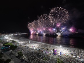 Fireworks explode during the New Year's celebration at Copacabana beach on January 1, 2024 in Rio de Janeiro, Brazil.