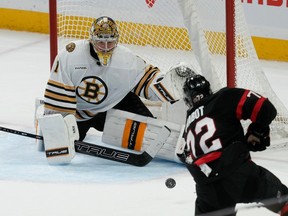 Ottawa Senators defenceman Thomas Chabot scores on Boston Bruins goaltender Jeremy Swayman